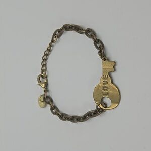 Gold toned key bracelet with engraving